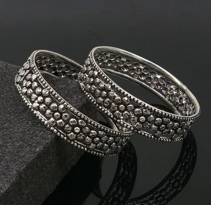 925 sterling silver wide floral design bangle bracelet by TRIBAL ORNAMENTS, showcasing intricate ethnic style and customizable details.