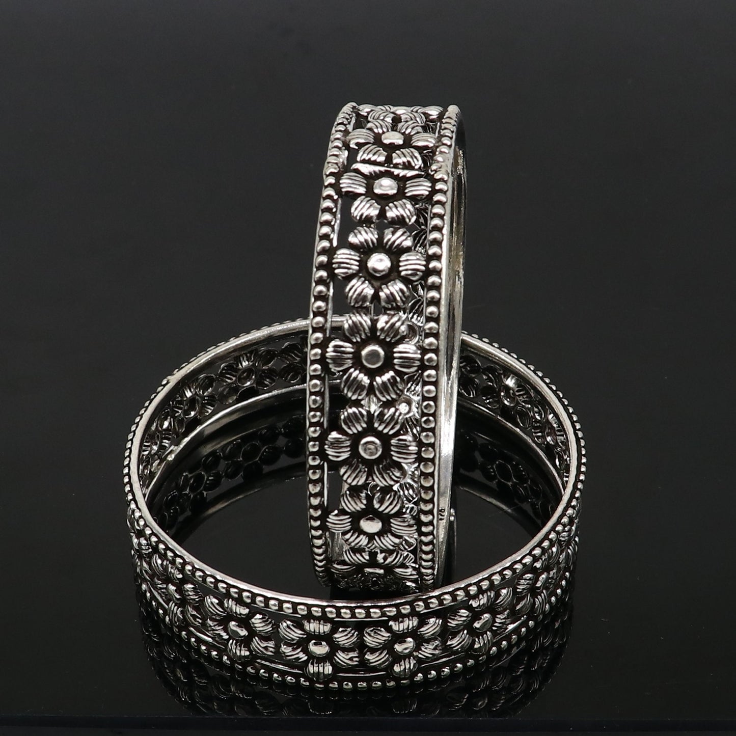 Sterling silver wide floral bangle bracelet by TRIBAL ORNAMENTS, stylish ethnic jewelry perfect for brides and special occasions.