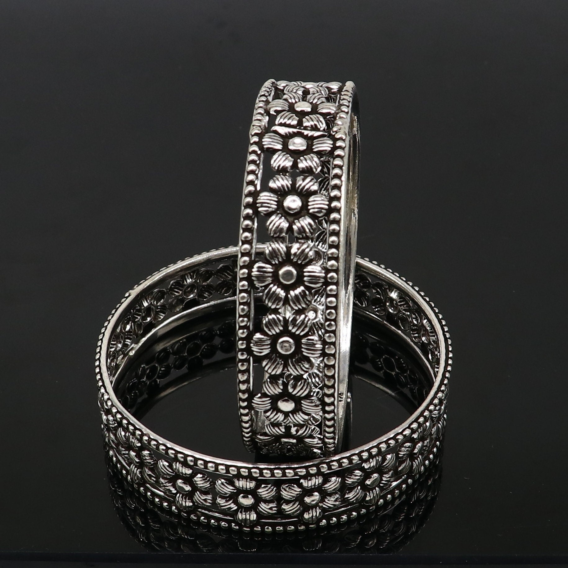 Sterling silver wide floral bangle bracelet by TRIBAL ORNAMENTS, stylish ethnic jewelry perfect for brides and special occasions.