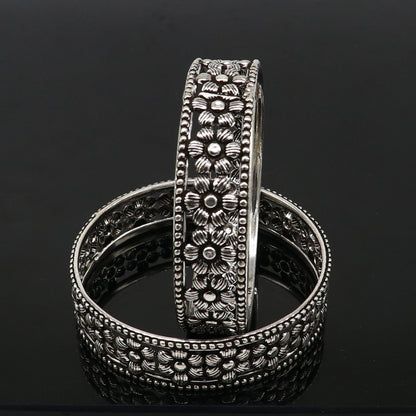 Sterling silver wide floral bangle bracelet by TRIBAL ORNAMENTS, stylish ethnic jewelry perfect for brides and special occasions.