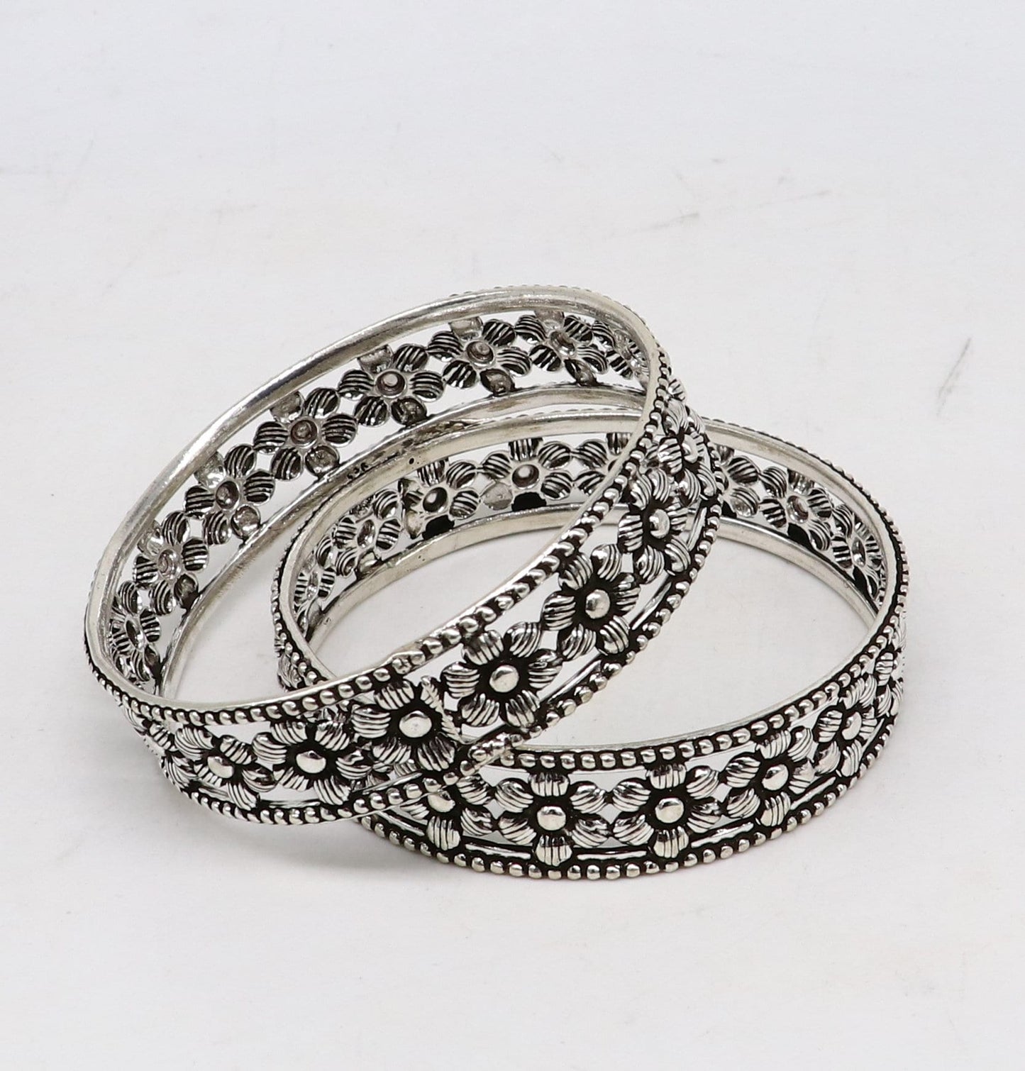 925 sterling silver wide floral bangle bracelet by TRIBAL ORNAMENTS, featuring intricate floral design and ethnic style perfect for brides.