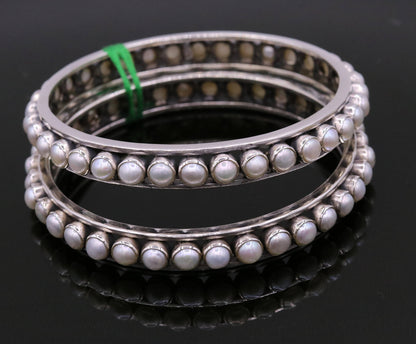 925 sterling silver pearl bangle bracelet from TRIBAL ORNAMENTS, featuring an oxidized, handcrafted bridal jewelry design.