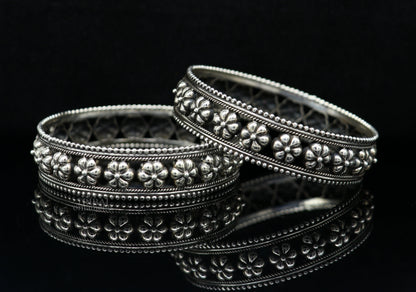 Vintage floral design 925 sterling silver bangle bracelet by TRIBAL ORNAMENTS, featuring intricate tribal ethnic jewelry craftsmanship.