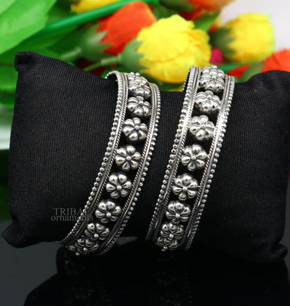 Vintage floral design 925 sterling silver bangle bracelet by TRIBAL ORNAMENTS, featuring intricate tribal ethnic jewelry craftsmanship.