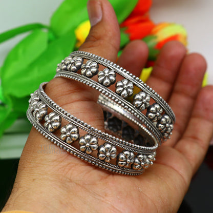 Sterling silver vintage floral bangle bracelet with tribal ethnic design, handmade by Tribal Ornaments.