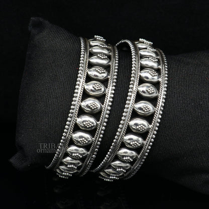 Handmade 925 sterling silver vintage floral bangle bracelet by TRIBAL ORNAMENTS, showcasing tribal and ethnic design details.
