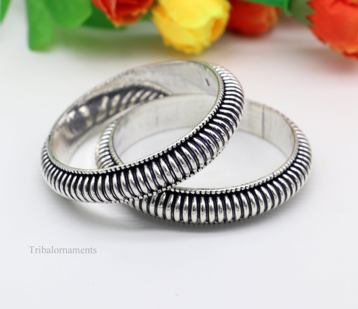 Sterling silver handmade Indian traditional vintage bangle bracelet with tribal design, stylish for brides or gifting.