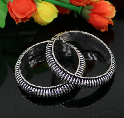 Sterling silver handmade Indian traditional vintage bangle bracelet with intricate tribal design, perfect for brides and jewelry gifting.