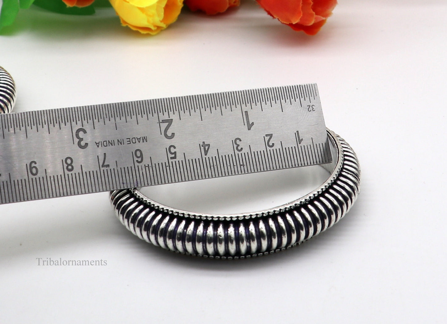 Handmade 925 sterling silver Indian traditional vintage bangle bracelet with intricate tribal design, stylish and suitable for bridal jewelry.