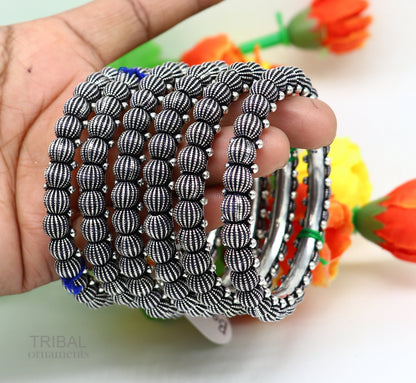 Sterling silver vintage tribal bangle bracelet with intricate design, handmade Indian jewelry for brides and stylish accessories.