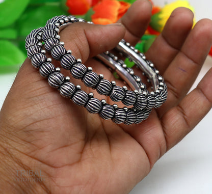 Sterling silver vintage bangle bracelet with tribal design, handmade Indian jewelry for brides, stylish and ethnic tribal bangles.