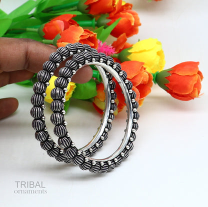 Sterling silver vintage tribal bangle bracelet with intricate design, handmade Indian jewelry for brides and stylish occasions.