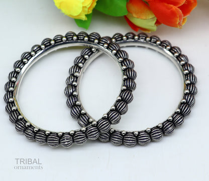 Sterling silver vintage tribal bangle bracelet with intricate handmade design, stylish jewelry for brides or ethnic gifting.