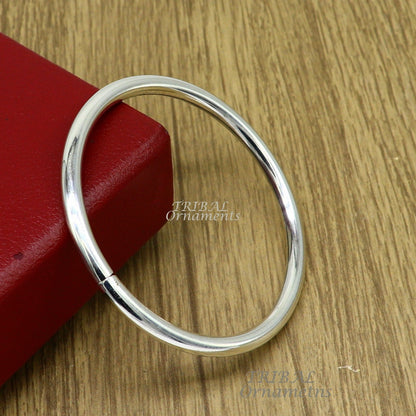Shiny 925 sterling silver handmade unisex bangle bracelet with a plain design, personalized and suitable for gifting.