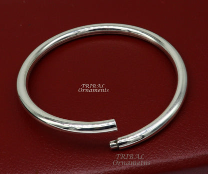 Shiny 925 sterling silver handmade bangle bracelet by Tribal Ornaments, plain and customized unisex jewelry, bright and polished.