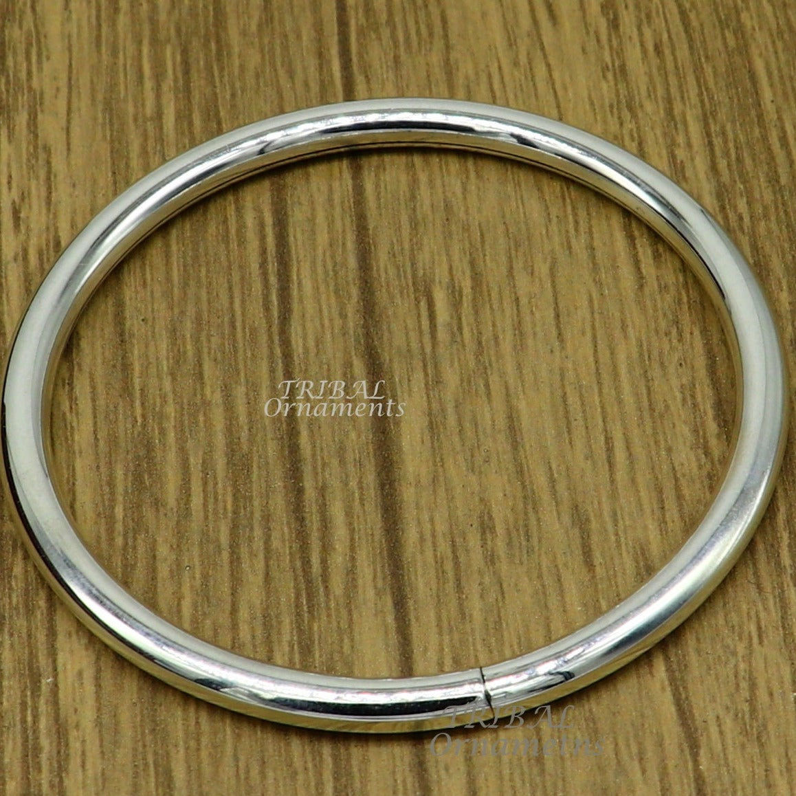 Shiny 925 sterling silver handmade plain bangle bracelet by Tribal Ornaments, unisex customized jewelry for gifting and everyday wear.