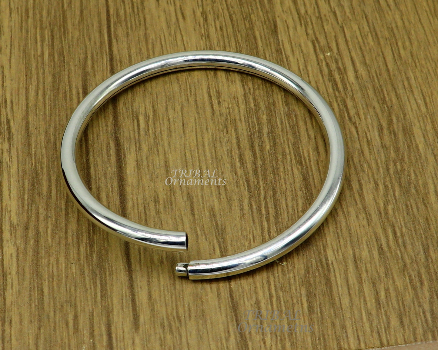 Sterling silver handmade plain shiny bangle bracelet by Tribal Ornaments, unisex jewelry, personalized gifting, stylish and bright.