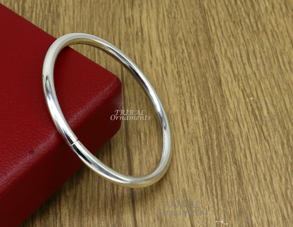 Sterling silver handmade bangle bracelet from Tribal Ornaments, shiny, plain, customizable unisex jewelry for personalized gifting