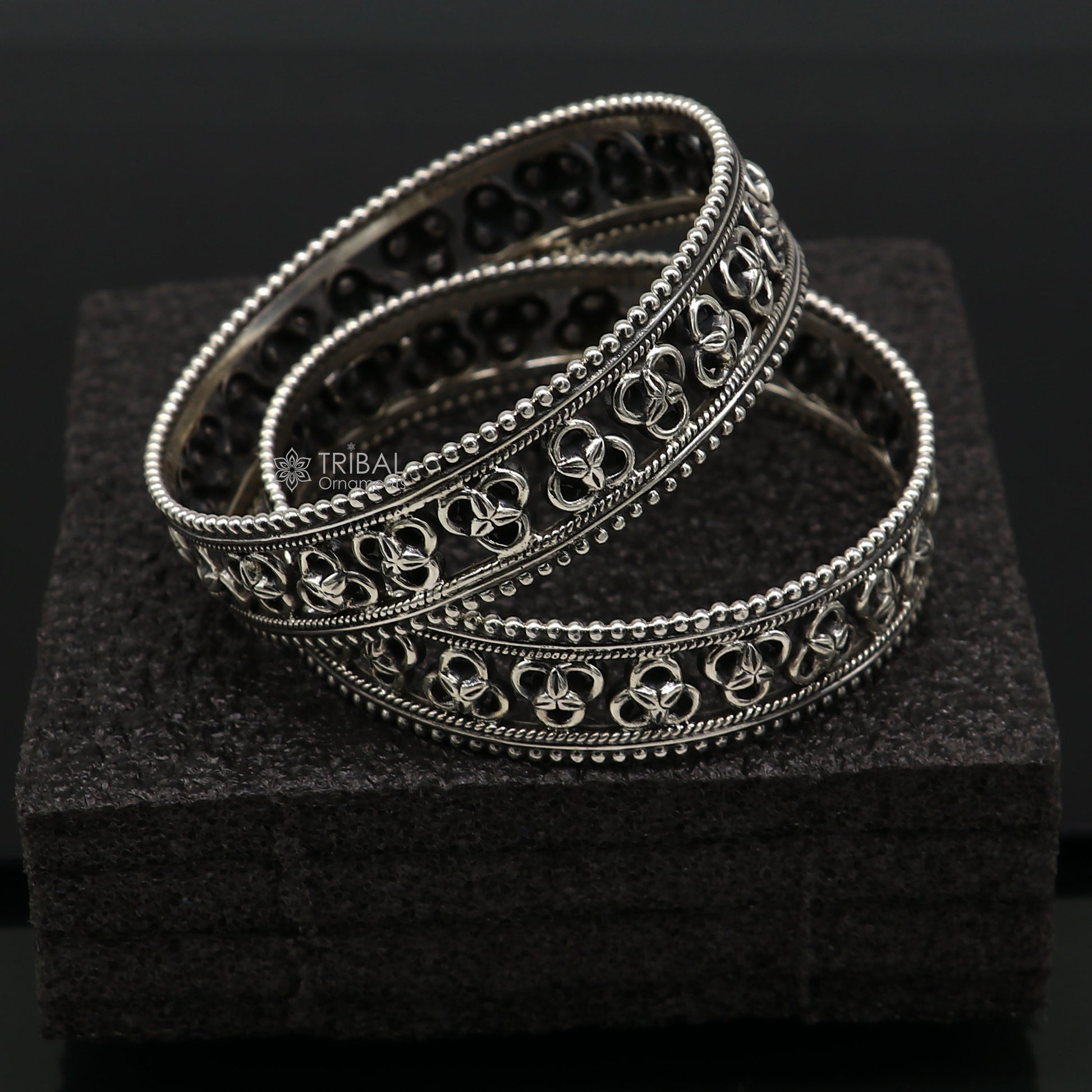 925 sterling silver tribal bangle bracelet with cultural design by TRIBAL ORNAMENTS, featuring intricate tribal jewelry motifs.