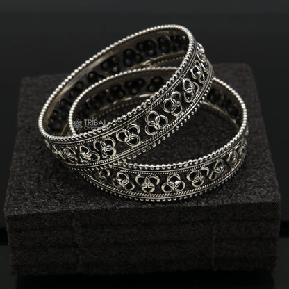 925 sterling silver tribal bangle bracelet with cultural design by TRIBAL ORNAMENTS, featuring intricate tribal jewelry motifs.