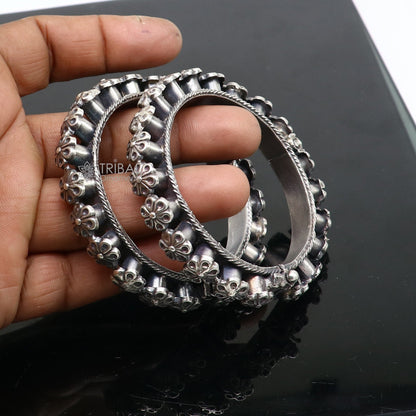 Sterling silver tribal floral bangle bracelet by TRIBAL ORNAMENTS, featuring intricate tribal design for wedding or cultural attire.