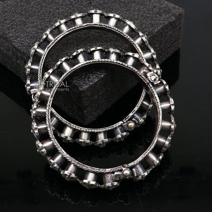Sterling silver tribal floral bangle bracelet by TRIBAL ORNAMENTS, featuring intricate tribal cultural design for wedding jewelry.