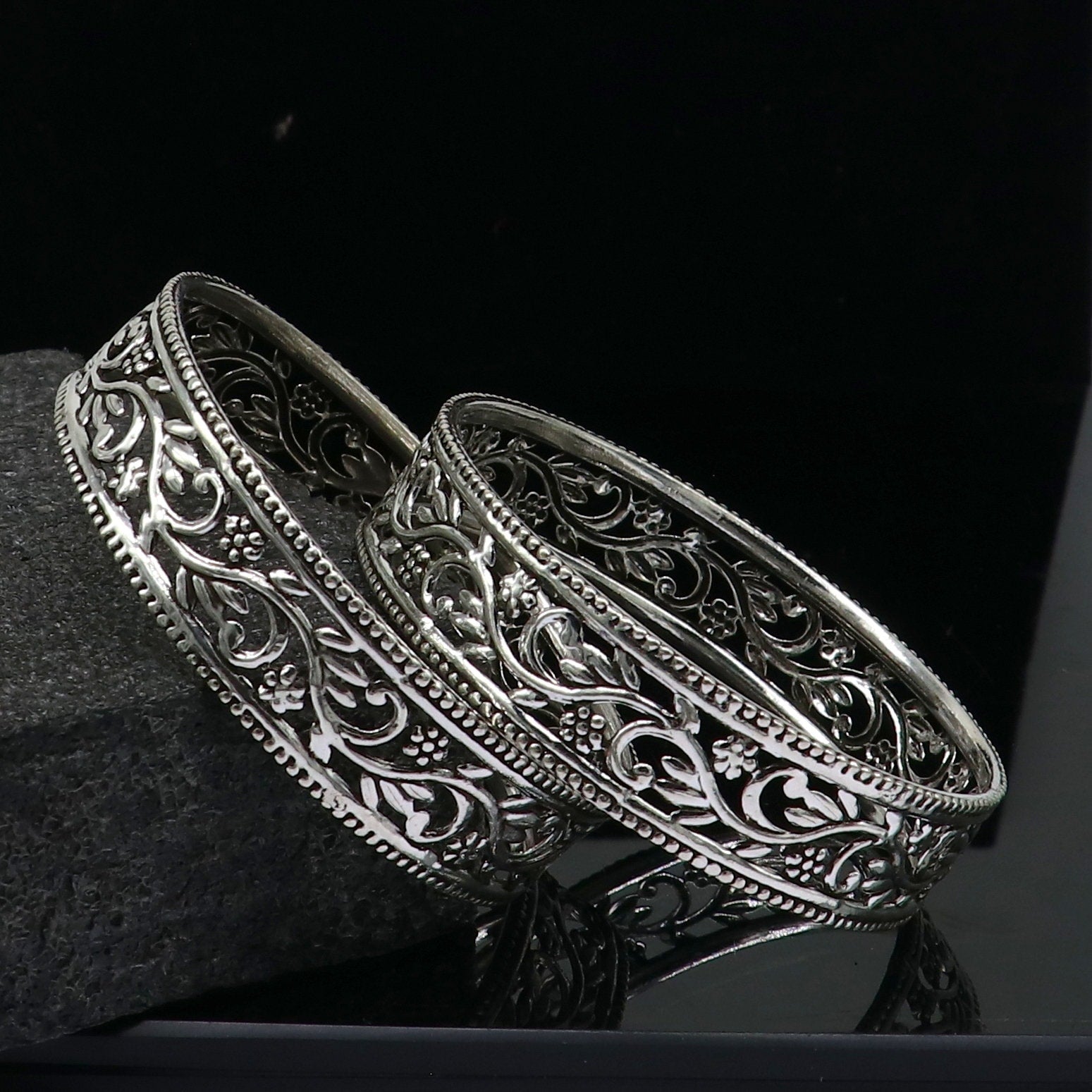 925 sterling silver wide floral design bangle bracelet by TRIBAL ORNAMENTS, showcasing ethnic stylish jewelry with intricate floral patterns.