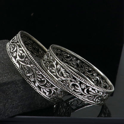 925 sterling silver wide floral design bangle bracelet by TRIBAL ORNAMENTS, showcasing ethnic stylish jewelry with intricate floral patterns.