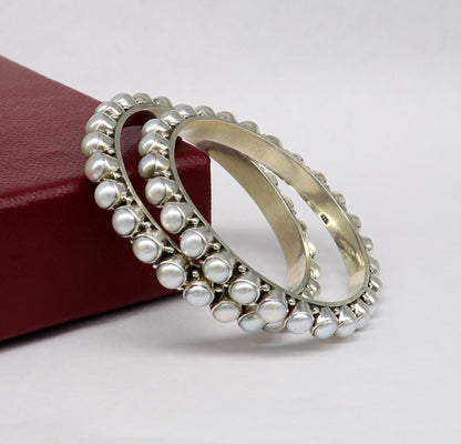 Elegant designer 925 sterling silver pearl bangle bracelet with oxidized finish, ideal for brides or special gifting.