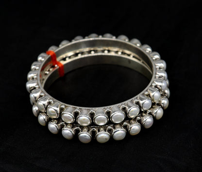 Designer 925 sterling silver pearl bangle bracelet with oxidized finish, perfect for brides or special occasions.