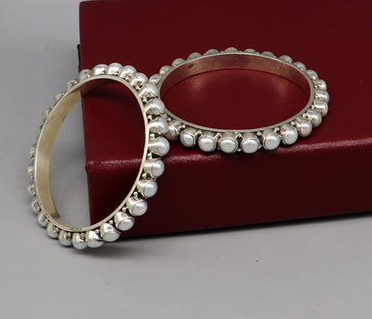 Sterling silver pearl bangle bracelet with oxidized finish, featuring a designer look perfect for brides or special gifting.