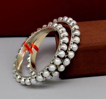 Elegant designer 925 sterling silver pearl bangle bracelet with oxidized finish, perfect for brides or special occasions.