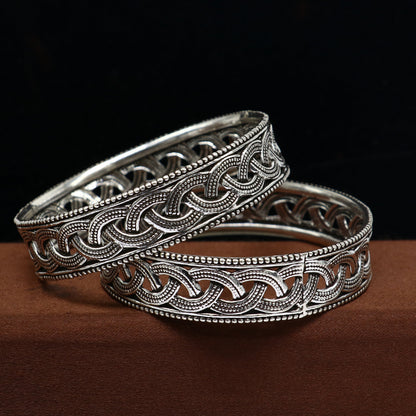 Sterling silver floral-style tribal bangle bracelet by TRIBAL ORNAMENTS, customized and stylish for brides and tribal fashion.