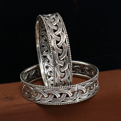 Sterling silver floral bangle bracelet by Tribal Ornaments, stylish tribal jewelry designed for brides and special occasions.