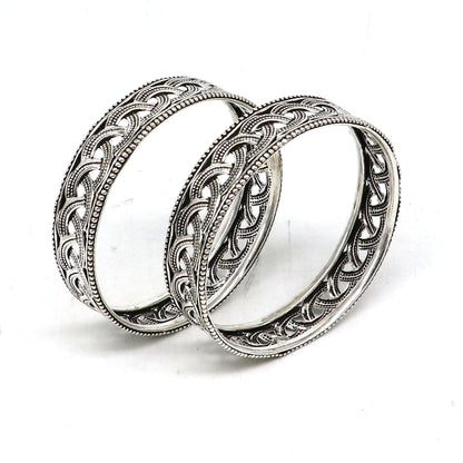 Sterling silver floral bangle bracelet by Tribal Ornaments, showcasing intricate tribal design for brides and ethnic fashion.