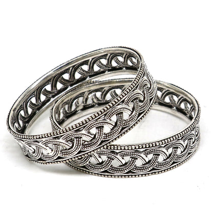 Sterling silver floral style bangle bracelet by TRIBAL ORNAMENTS, featuring intricate tribal design for brides and ethnic fashion.