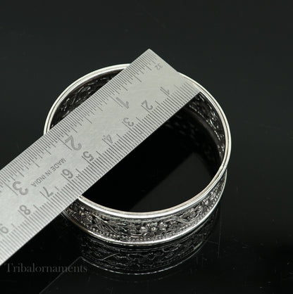 Sterling silver floral-style bangle bracelet from TRIBAL ORNAMENTS featuring ethnic tribal jewelry design.