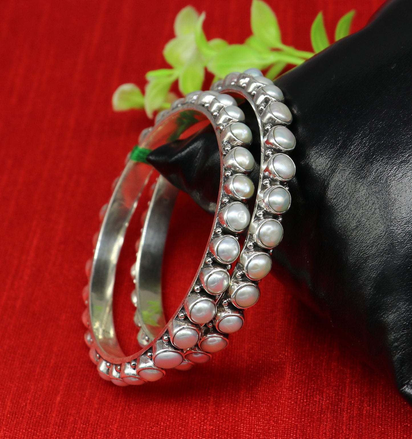 Sterling silver Waved design pearl bangle bracelet by TRIBAL ORNAMENTS with oxidized finish, perfect for brides or special gifts.