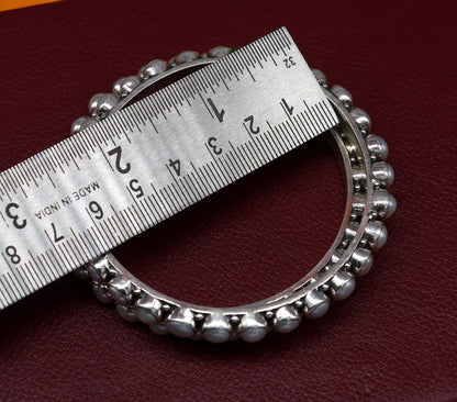Sterling silver Waved design pearl bangle bracelet with oxidized finish, perfect for brides, by TRIBAL ORNAMENTS.