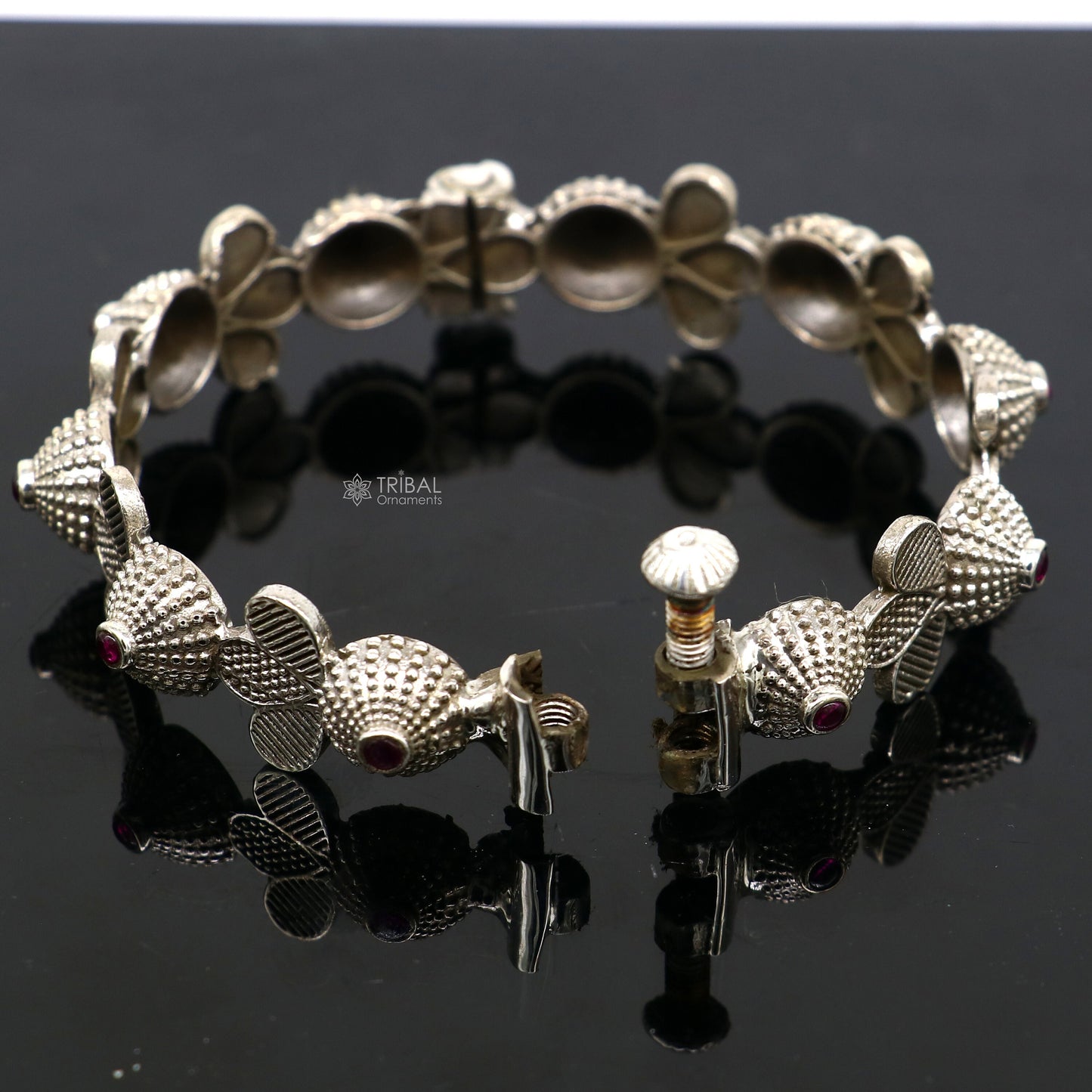 925 sterling silver tribal bangle bracelet with red stone accents, featuring intricate cultural design, ideal for wedding jewelry.