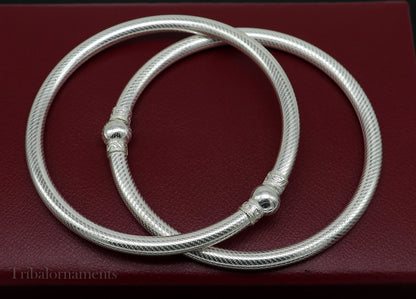Vintage silver women's foot and ankle kada bracelet with hollow tribal design, handmade traditional Indian jewelry by TRIBAL ORNAMENTS.