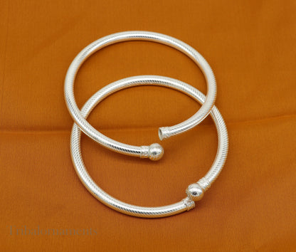 Vintage silver women's ankle kada bracelet with hollow tribal design, traditional Indian jewelry, handcrafted by TRIBAL ORNAMENTS.