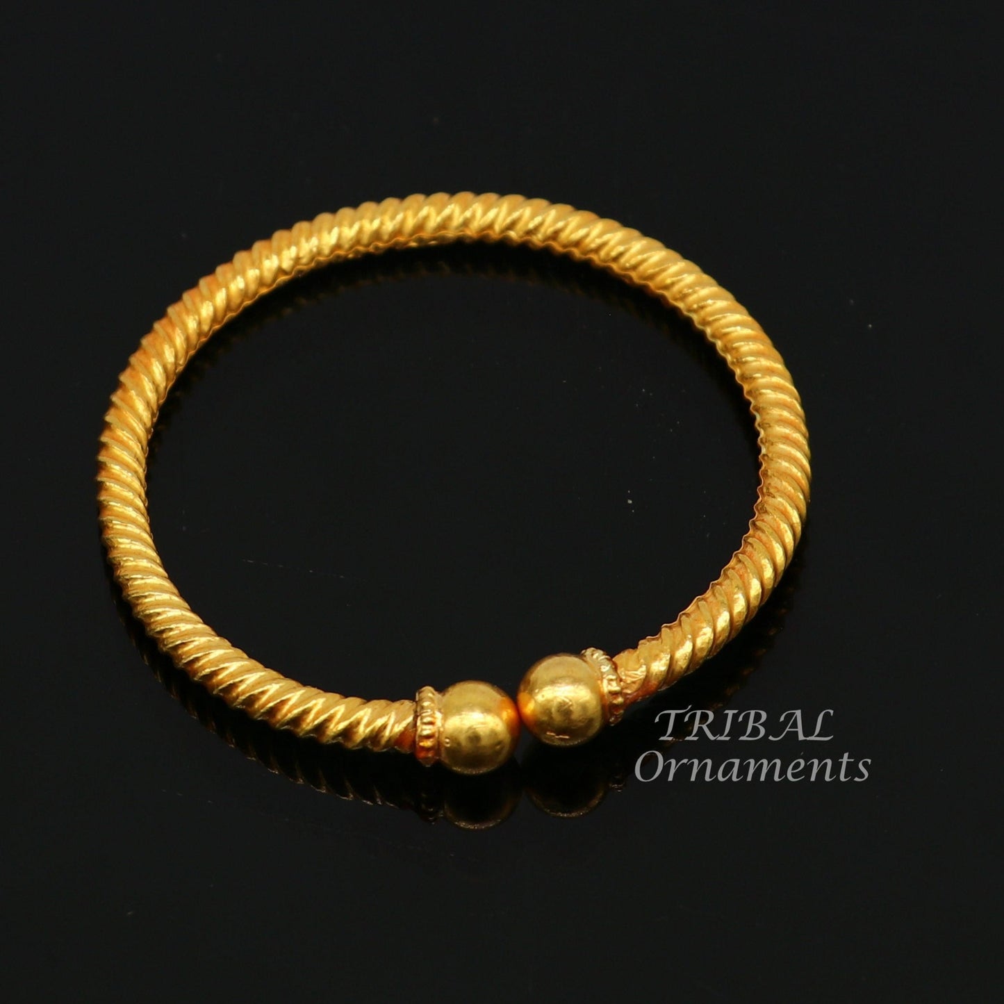 22K yellow gold baby bangle by TRIBAL ORNAMENTS featuring vintage ball face design, handmade hallmarked jewelry for kids.