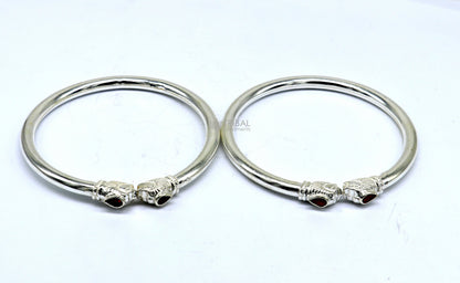 Sterling silver lion face design kada bracelet by Tribal Ornaments, lightweight trendy jewelry for men and girls.