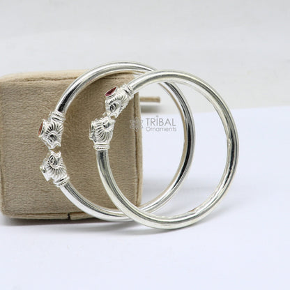 Sterling silver handmade lion face design kada bracelet by TRIBAL ORNAMENTS, lightweight and trendy jewelry for men and women.