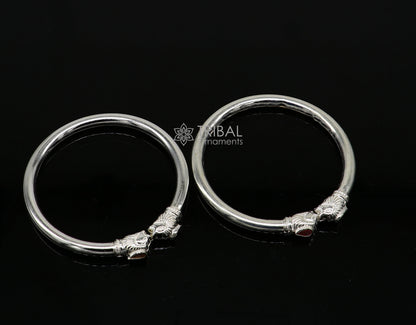 Sterling silver handmade lion face design kada bracelet by TRIBAL ORNAMENTS, lightweight and trendy jewelry for men and girls.