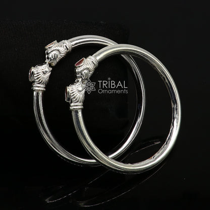 Sterling silver handmade lion face design kada bracelet by TRIBAL ORNAMENTS, lightweight and trendy jewelry for men and women.