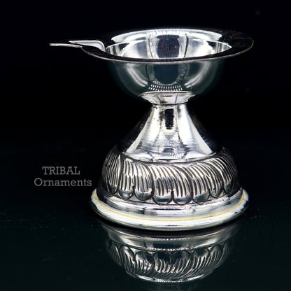 Sterling silver oil lamp featuring customized chitai and kandrai work, traditional Deepak for puja, by TRIBAL ORNAMENTS.