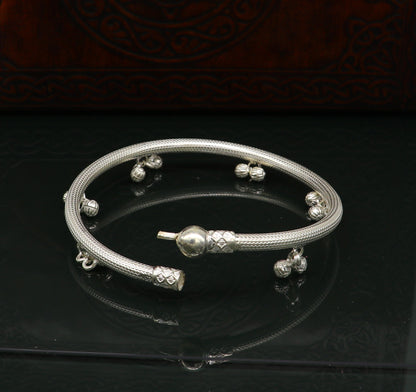 Sterling silver handmade foot bangle bracelet with jingling bells and tribal design, perfect for belly dance jewelry.