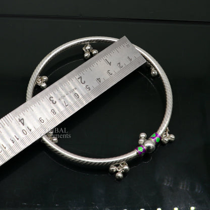 Sterling silver handmade foot bangle bracelet with jingling bells and tribal design, ideal for belly dance jewelry.